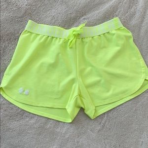 Bright yellow Under Amour shorts